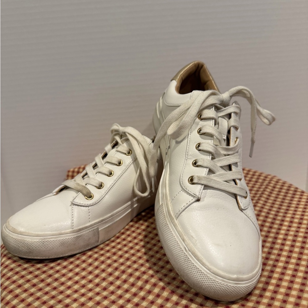 Loft women’s 9 M  white tennis shoes gold  backs. Pre owned  great condition